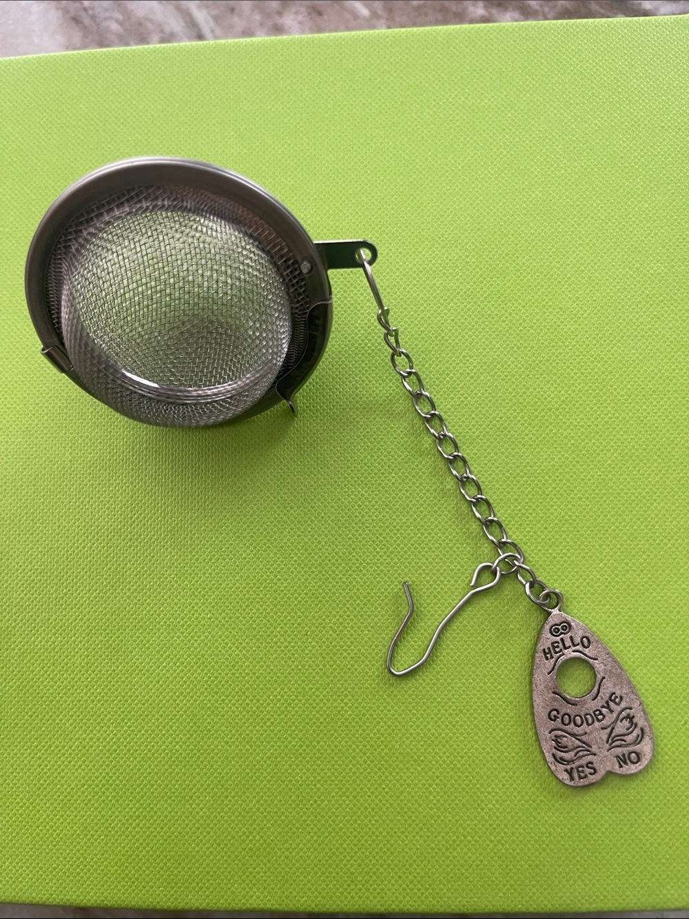 Stainless Steel Tea Infuser with Ouija Charm NWOT never used